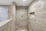 MP313 has a soaker tub and this large walk-in shower